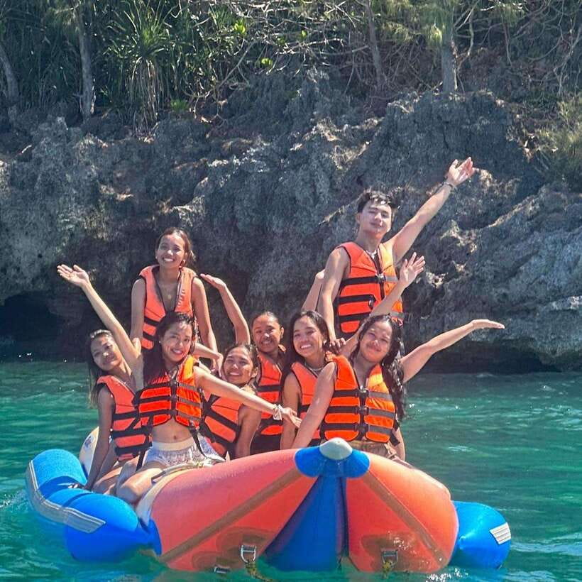 Boracay: Banana Boat Ride - Life jackets first, then the inflatable banana boat