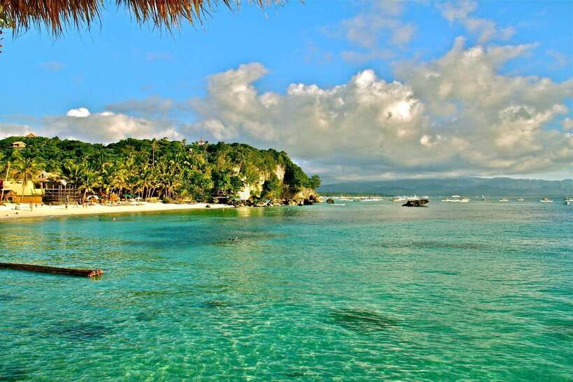 Boracay: Island Hopping | Pick-up at the Hotel - Puka Beach brings a quieter first stop