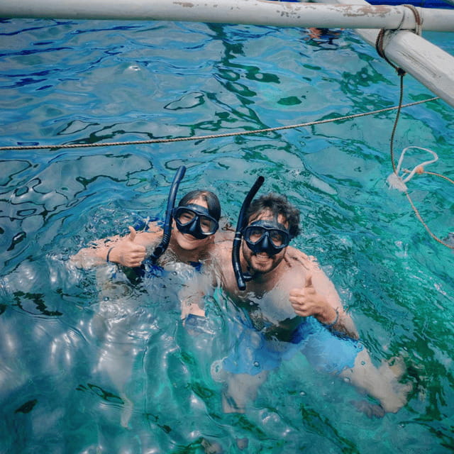 Boracay: Island Hopping with Lunch and Parasailing - What $99 includes, and what it does not