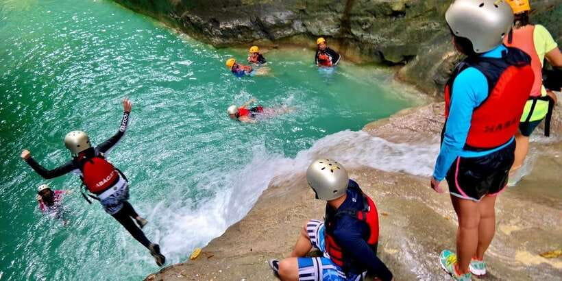Cebu: Kawasan Falls Canyoneering & Cliff Jump Private Tour - Reaching the three-level Kawasan Falls