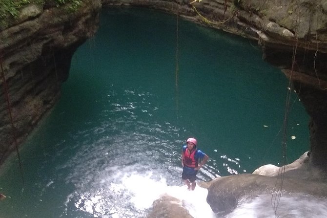 Cebu Oslob Whale Sharks and Sumilon Island Kawasan Falls Canyoneering - Tumalog Falls in a short, cool stop