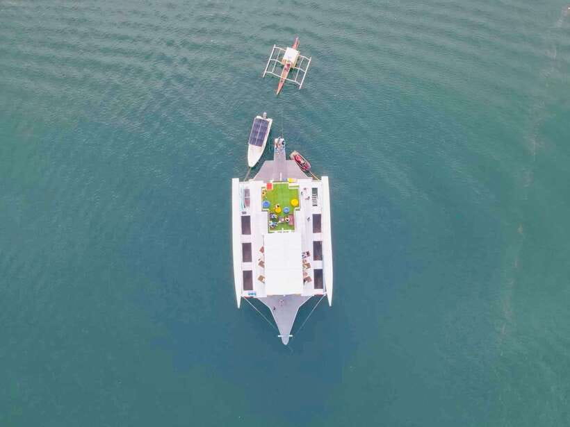 Coron Island: Premier Trimaran Tour - From Coron hotel to the upper deck