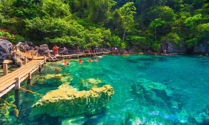 Coron: Off-Bay Islands, Lagoons and Lakes Hopping Tour - Atwayan Beach brings lunch and downtime