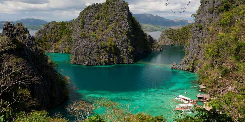 Coron Tour A: Kayangan Lake & Quin Reef Tour with Lunch - Sunset Beach and lunch beside the water