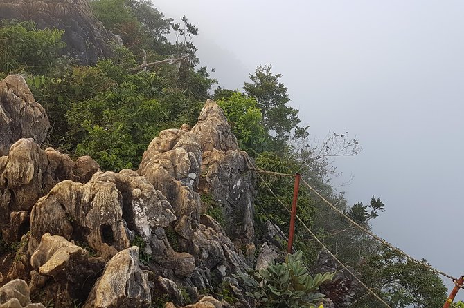 Day hike to Mount Daraitan with Tinipak River 2024 - Summit views of clouds, peaks, and open Rizal