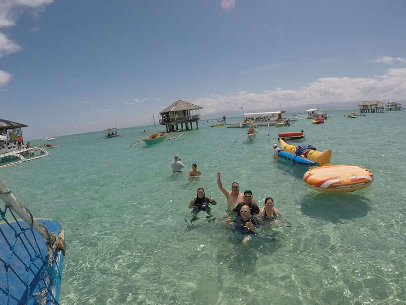 Dumaguete: Dolphin Watching & Manjuyod Sandbar Private Tour - Swimming and snorkeling around Manjuyod Sandbar