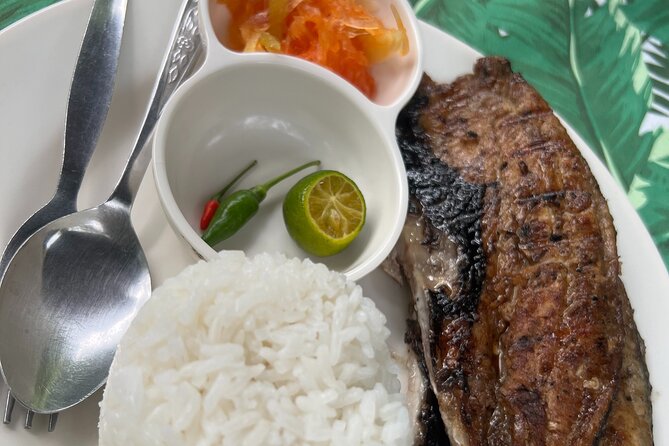 Dumaguete Foodie Tours in English - Sampling dishes at food stalls and restaurants