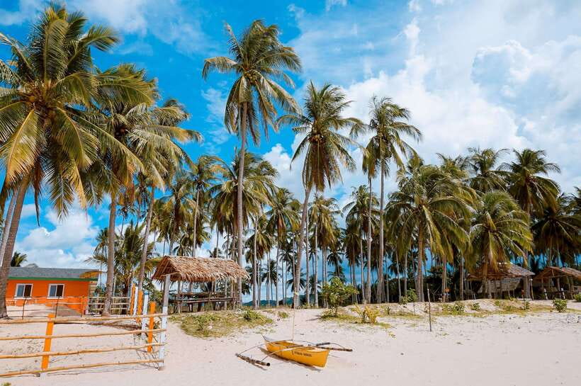 El Nido Island Hopping Tour C: Hidden Beaches & Shrine - Hidden Beach and coral-lined shallows