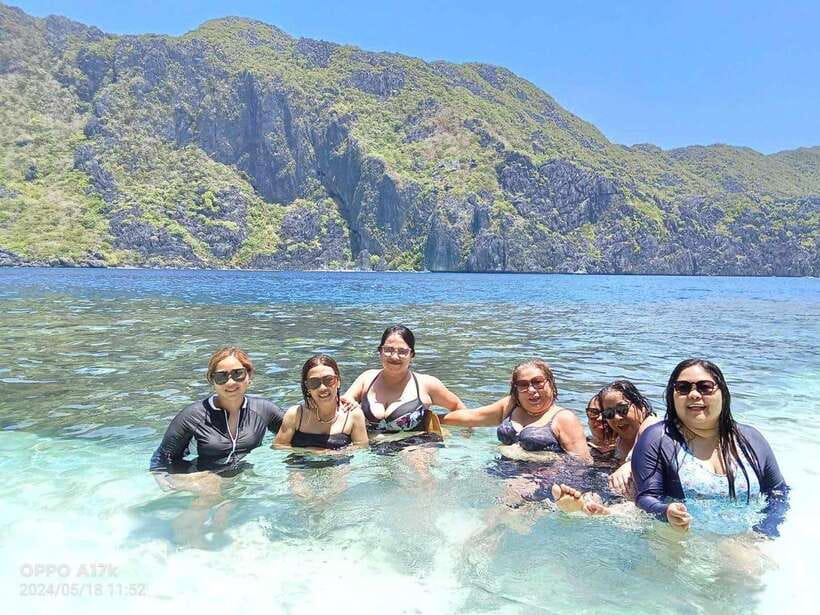 El Nido: Shared Island Hopping Tour C with Buffet Lunch - Hidden Beach: a short swim into a limestone cove