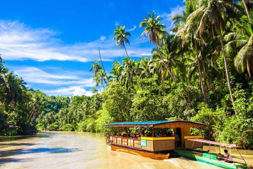 From Cebu: Day Trip to Bohol Highlights - Lunch aboard the Loboc River floating restaurant