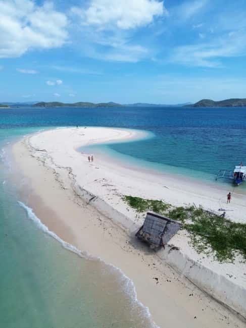 From Coron: Explore Busuanga Beach Escapade - Dibutonay Island, your first hour in the water