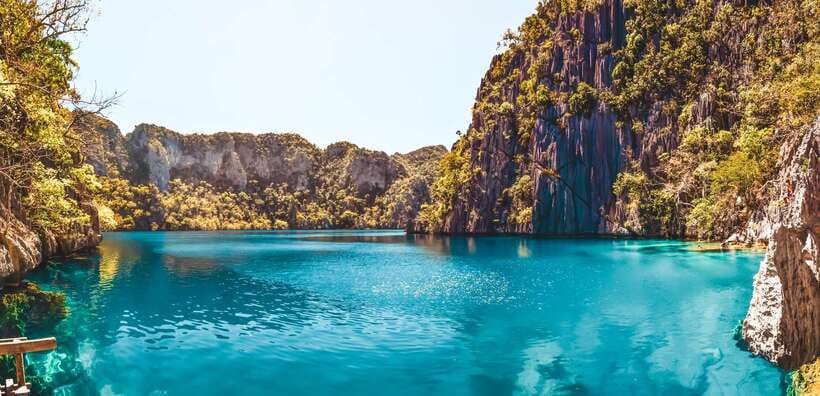 From Coron: Island Hopping Boat Day Trip with Buffet Lunch - Beach lunch with fresh food and simple drinks
