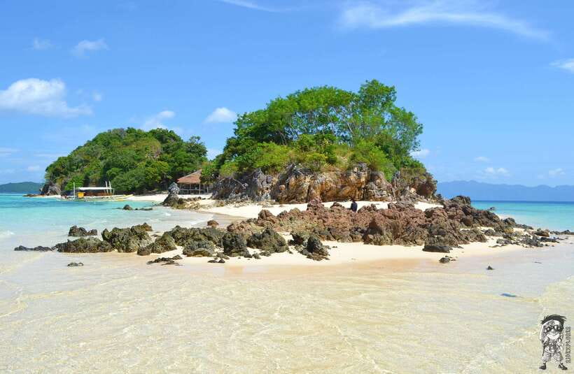 From Coron: Private Island-Hopping Cruise with Lunch - Banana Island and its curved strip of sand