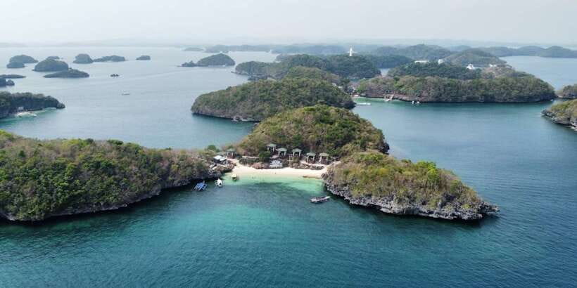 From Manila: Pangasinan Hundred Islands Guided Tour - A final swim before returning to port