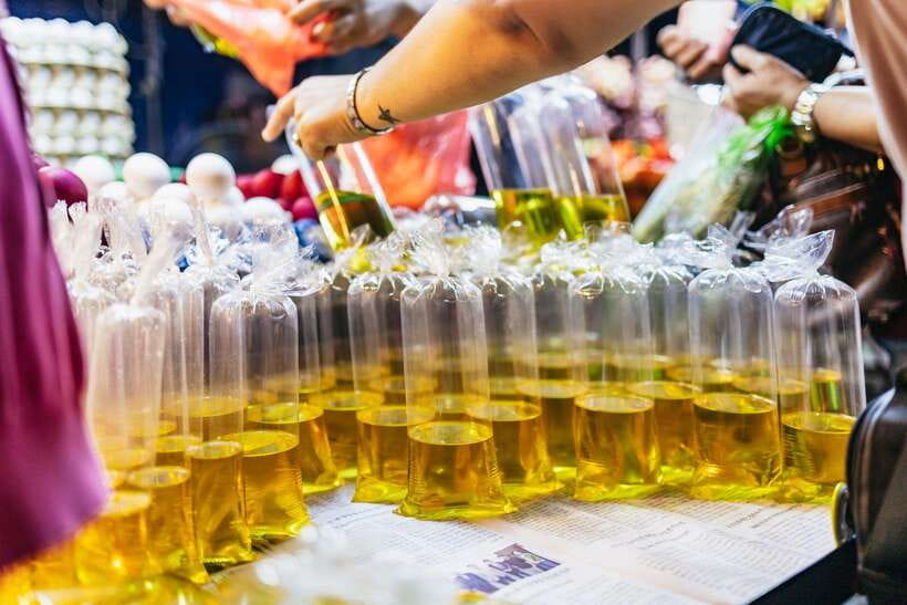 Manila: Guided Night Market Experience - Riding a tuk-tuk, train, and jeepney