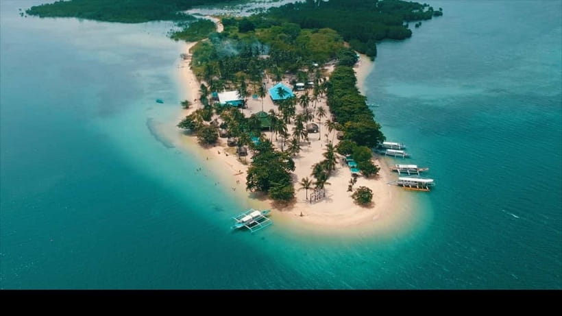 Puerto Princesa: Cowrie Island Guided Day Tour with Meal - Swimming, snorkeling, and what you should expect underwater