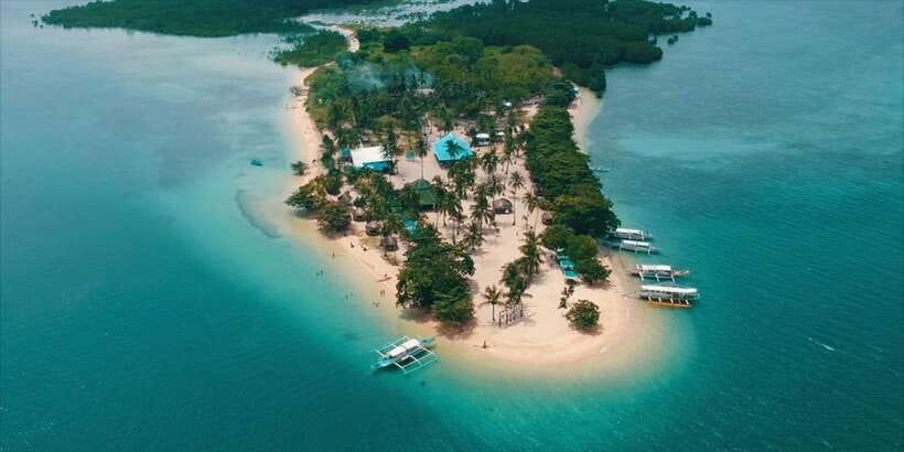 Puerto Princesa: Cowrie Island Guided Day Tour with Meal - Massage and shower time before the ride back