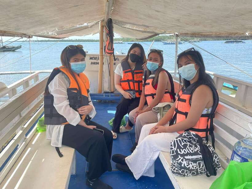 Puerto Princesa: Honda Bay Tour with Lunch - Cowrie Island, lunch, and water activities
