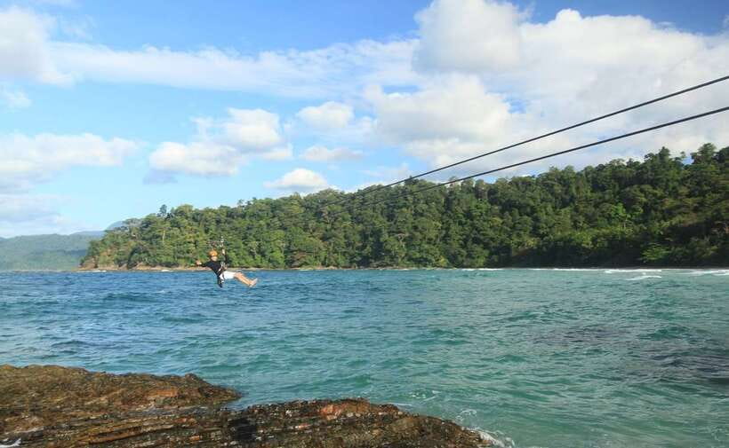 Puerto Princesa: Underground River, Zipline, Paddleboat Tour - Sabang wharf, permits, and the boat ride