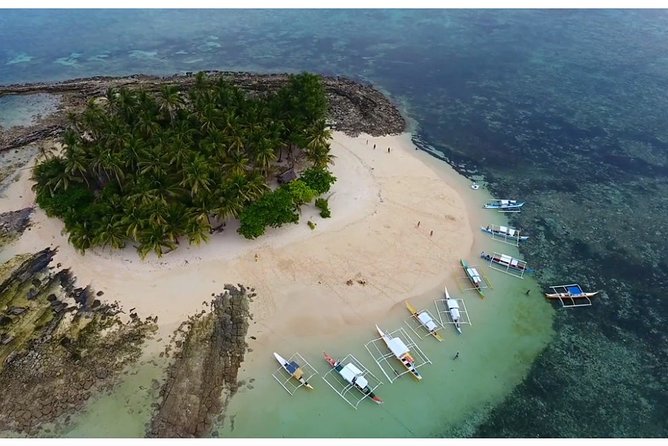 Siargao Island Hopping & land Tour - Daku Island, where the beach meets a community