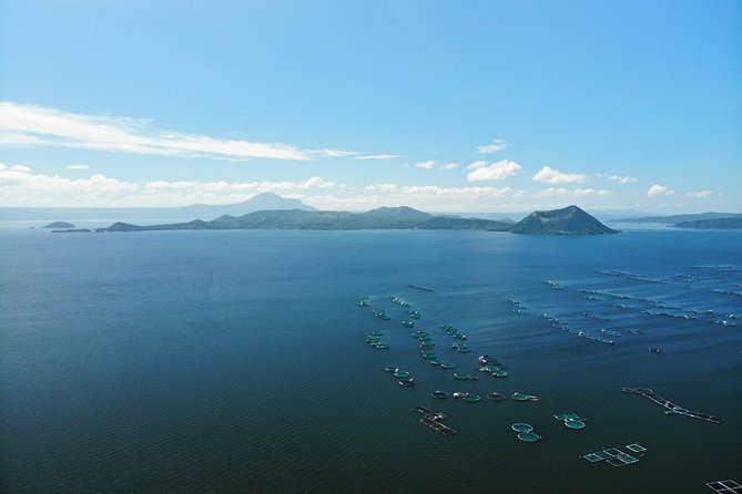 Tagaytay Adventure: Volcano Views, Countryside, Market & Cruise! - Taal Lake by Local Boat